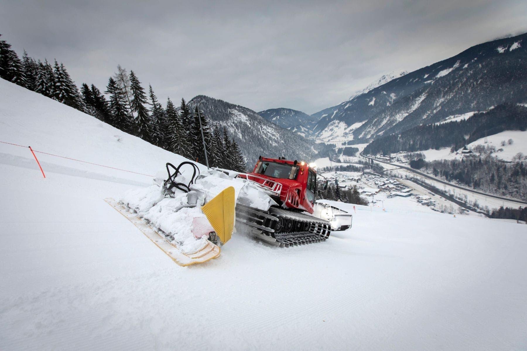 greener-skier-snow-groomers