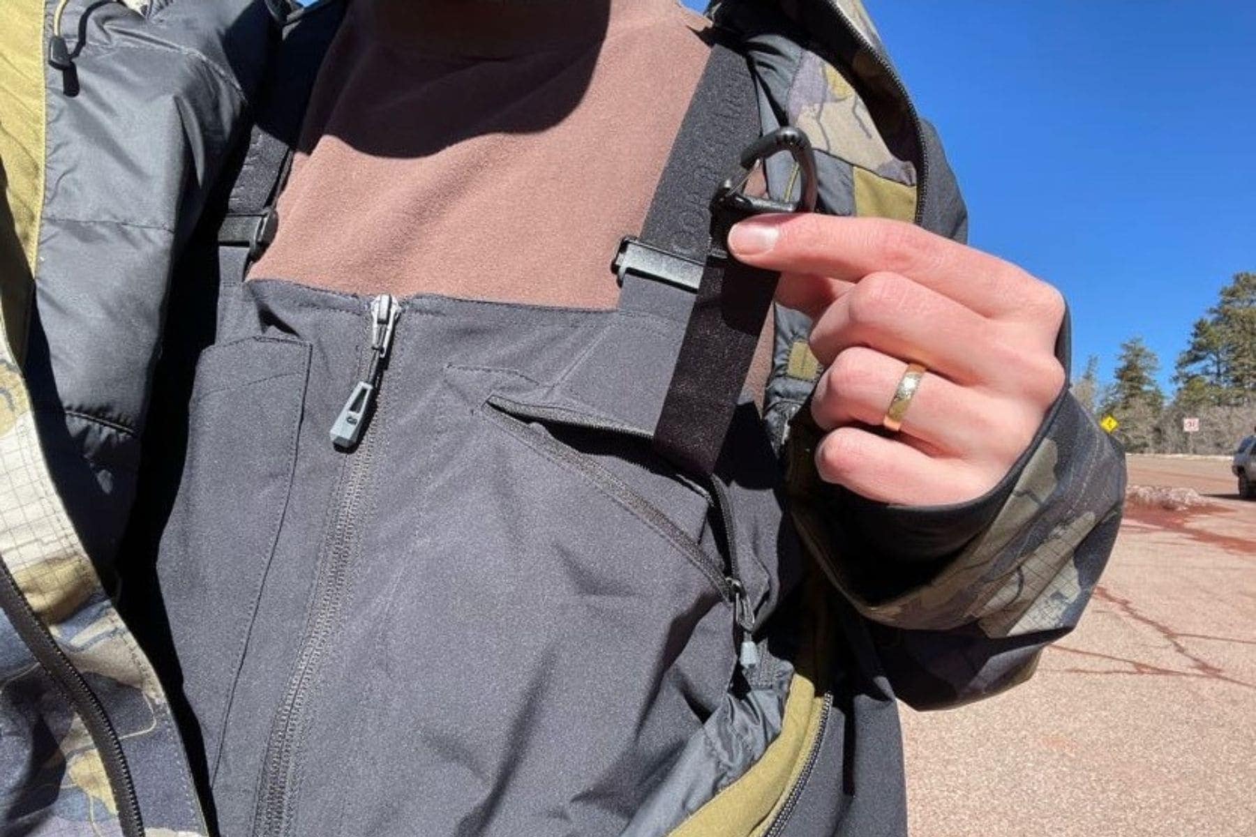Zippered left breast pocket, featuring a beacon clip!
