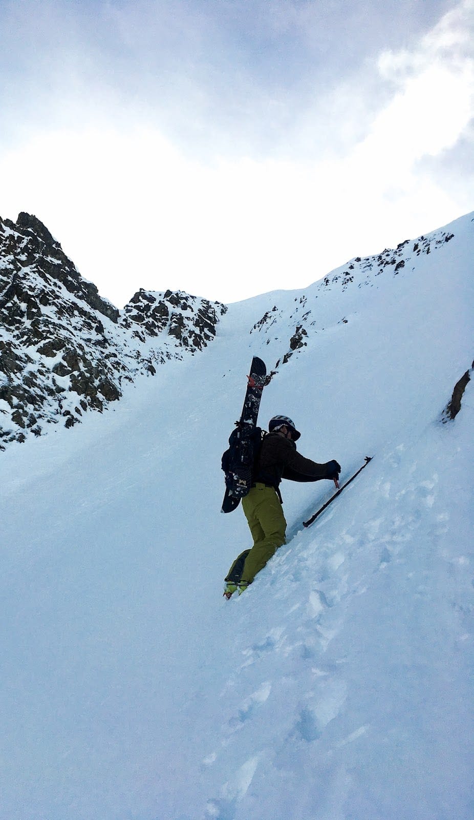 Kicking steps up a steep face. Thank god for hard boots and crampons.
